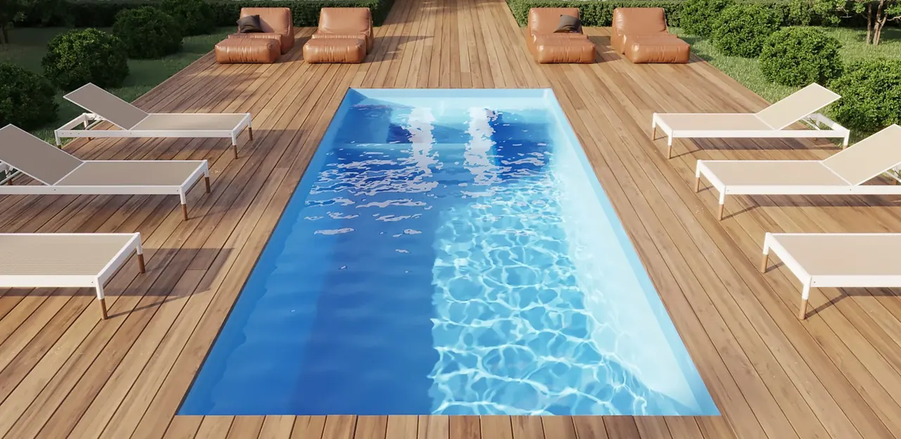 Piscina X-Pools instalada, con deck de madera y tumbonas alrededor